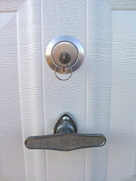 Silicone spray lubricates door locks to keep them moving smoothly and working properly.